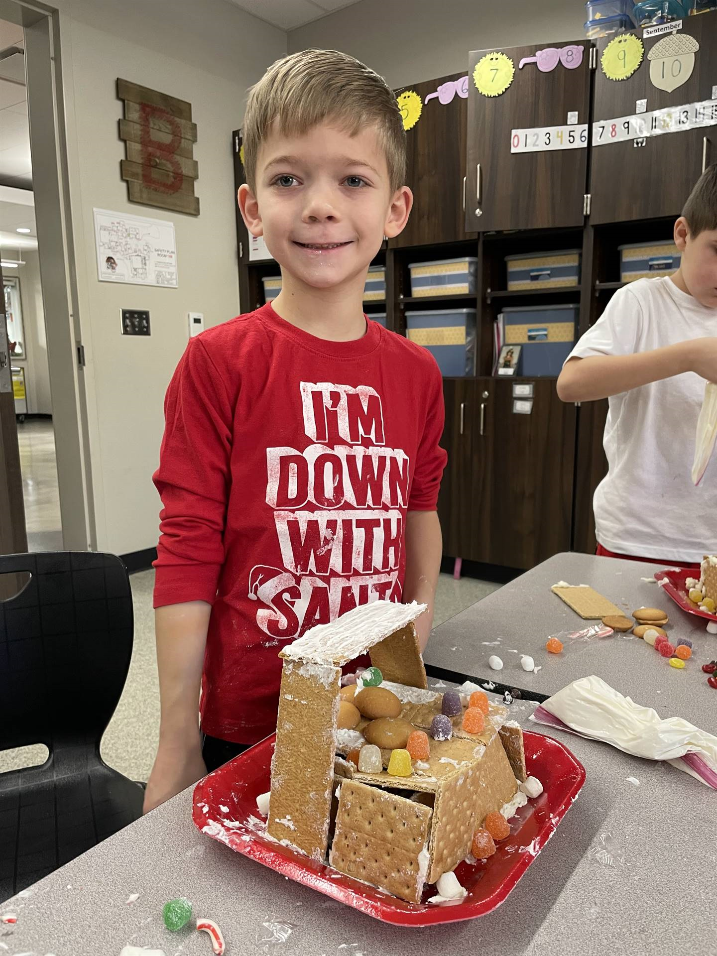 Sean with gingerbread house