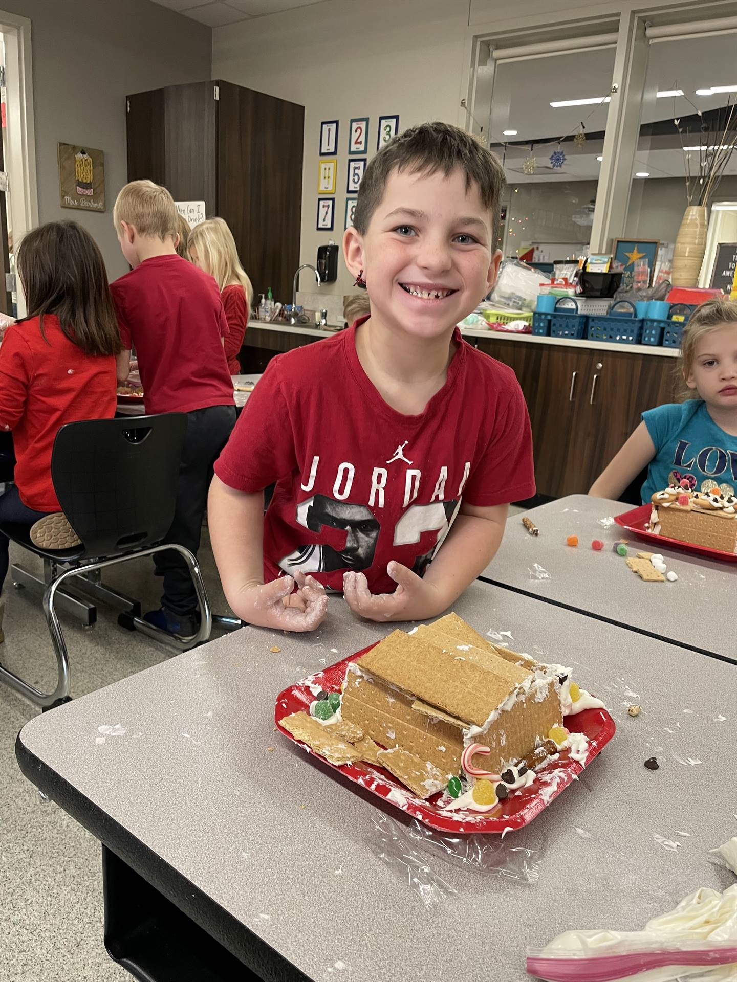 Mason with gingerbread house