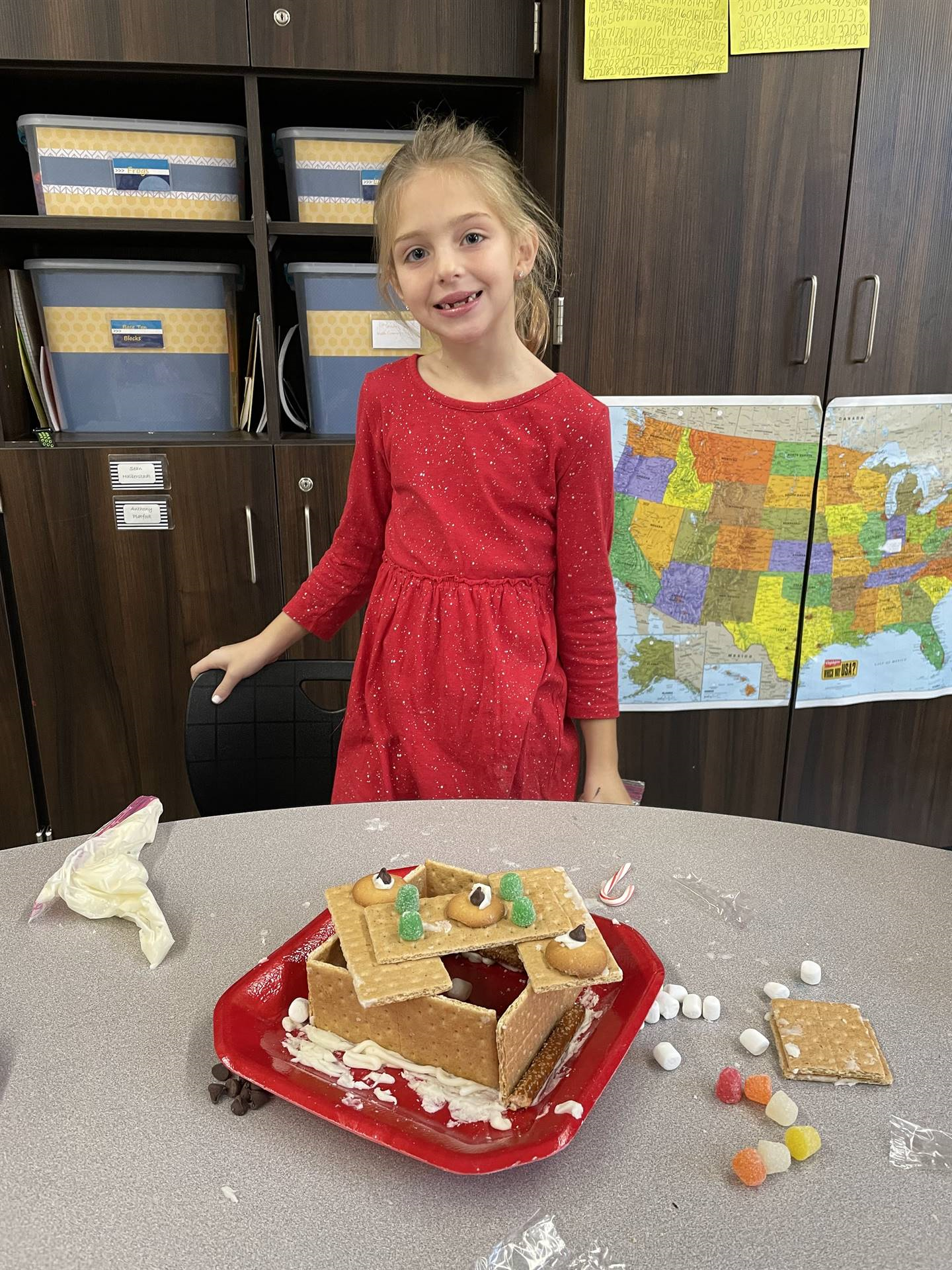 Brinkley with gingerbread house