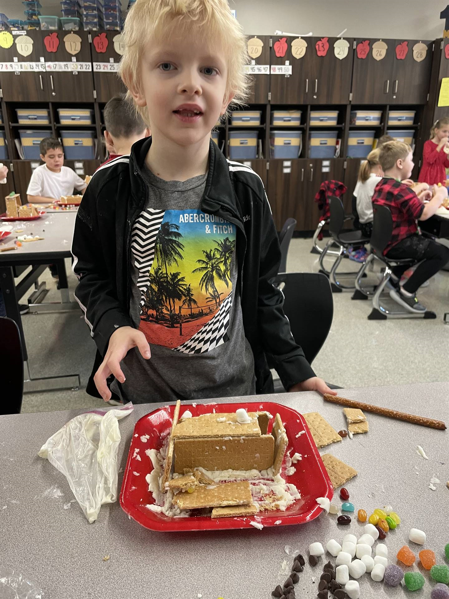 Willie with gingerbread house