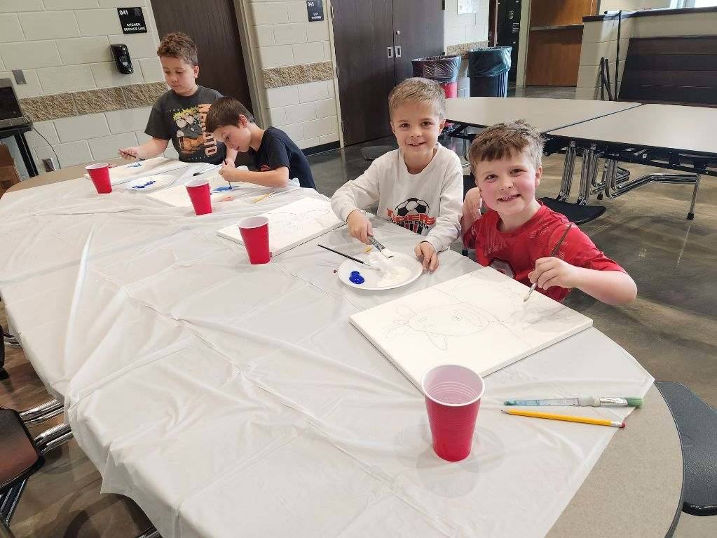 Cookies and Canvas - Kids starting to paint