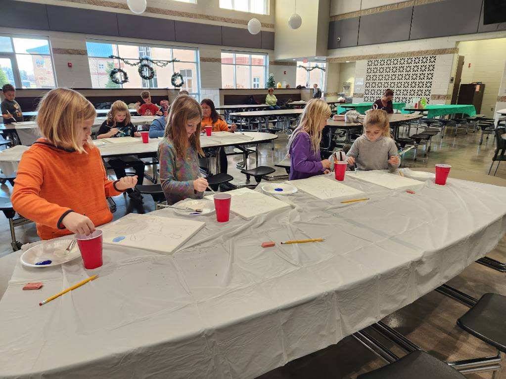 Cookies and Canvas - Kids starting to paint
