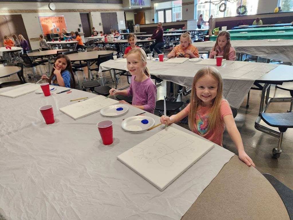 Cookies and Canvas - Kids starting to paint