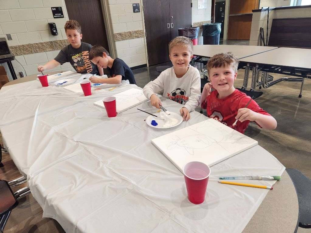 Cookies and Canvas - Kids starting to paint