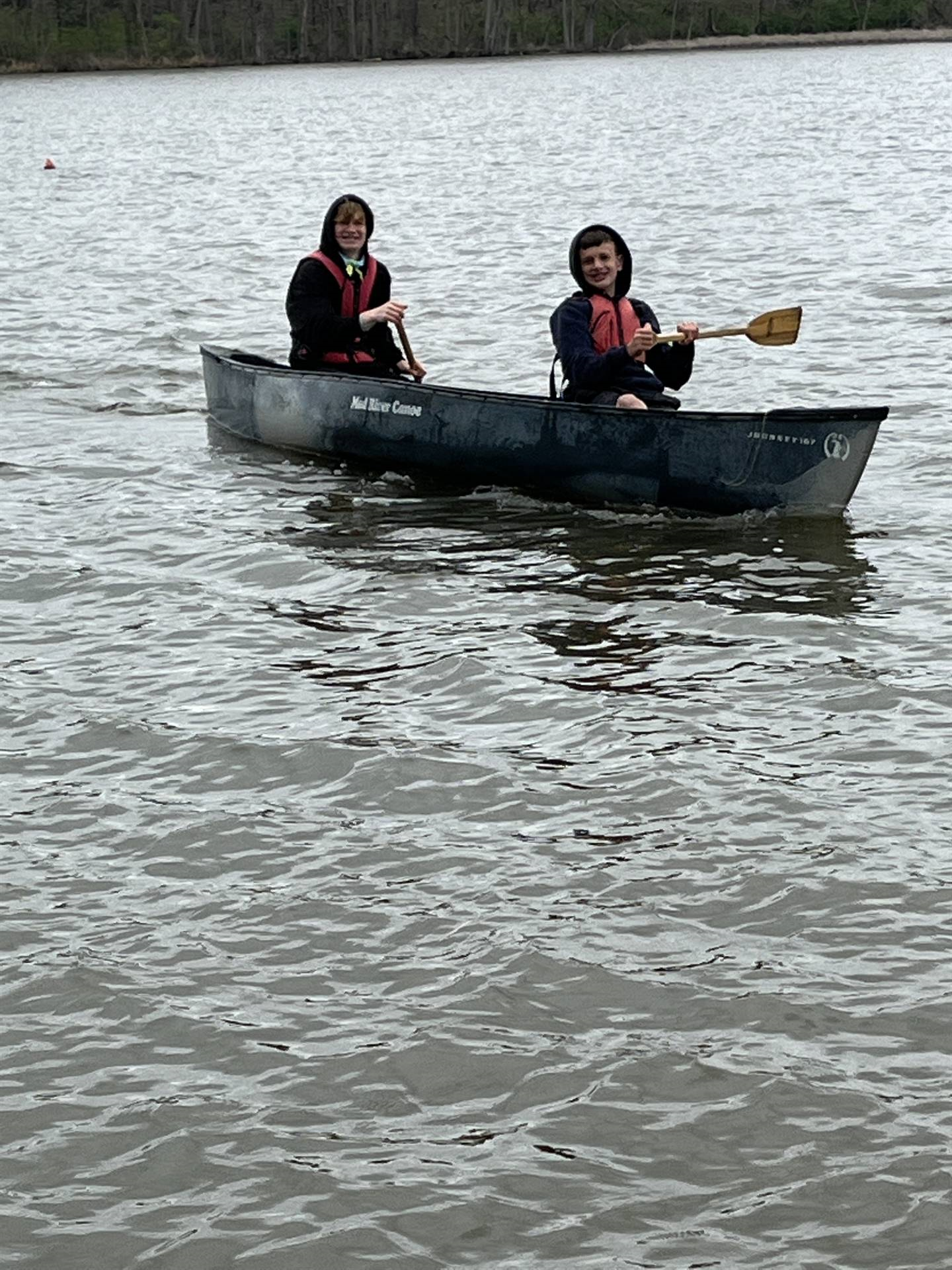 two students in canoe at camp willson