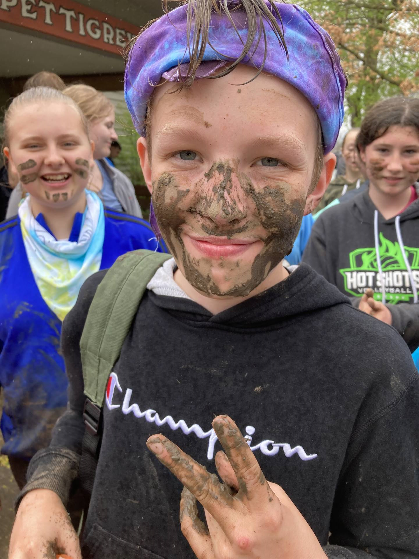 a muddy student face at camp willson