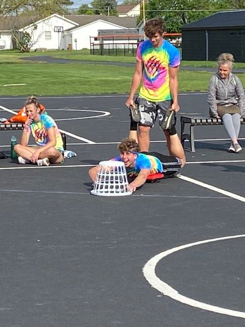 student playing games on field day
