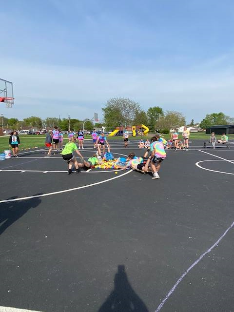 students playing games on field day
