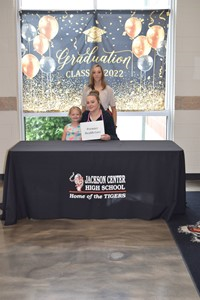 Faith Boggs with mother and sister