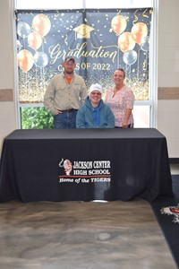 Landon Martin with parents