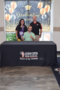 Gage Sherman with parents