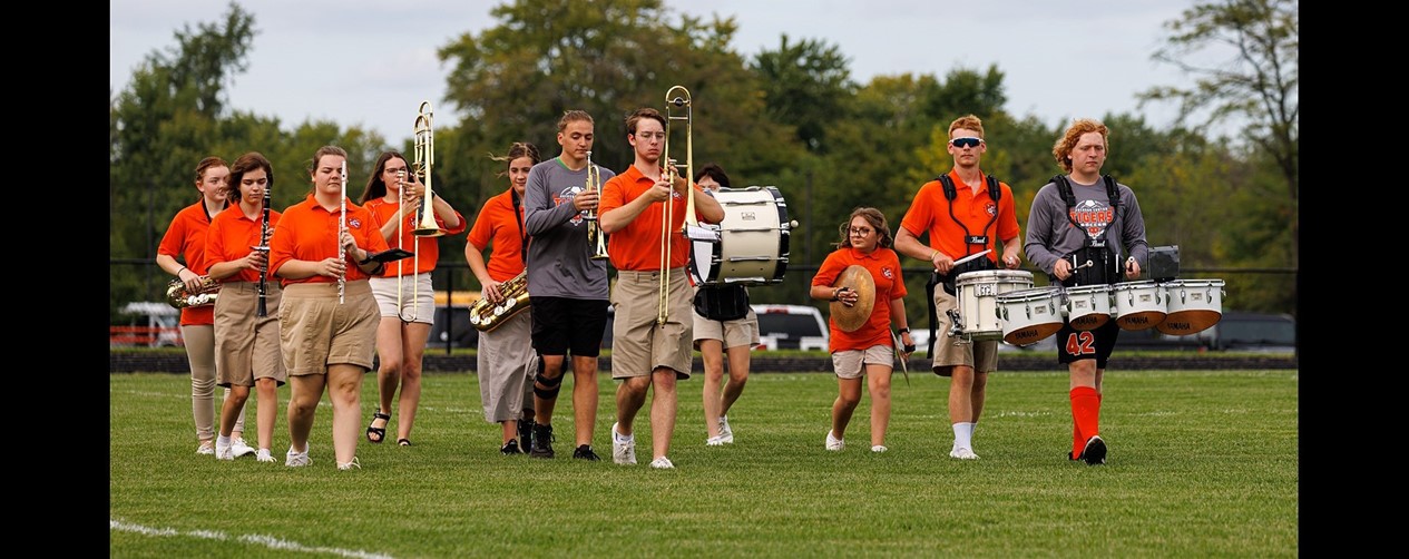 marching band at homecoming show on soccer field