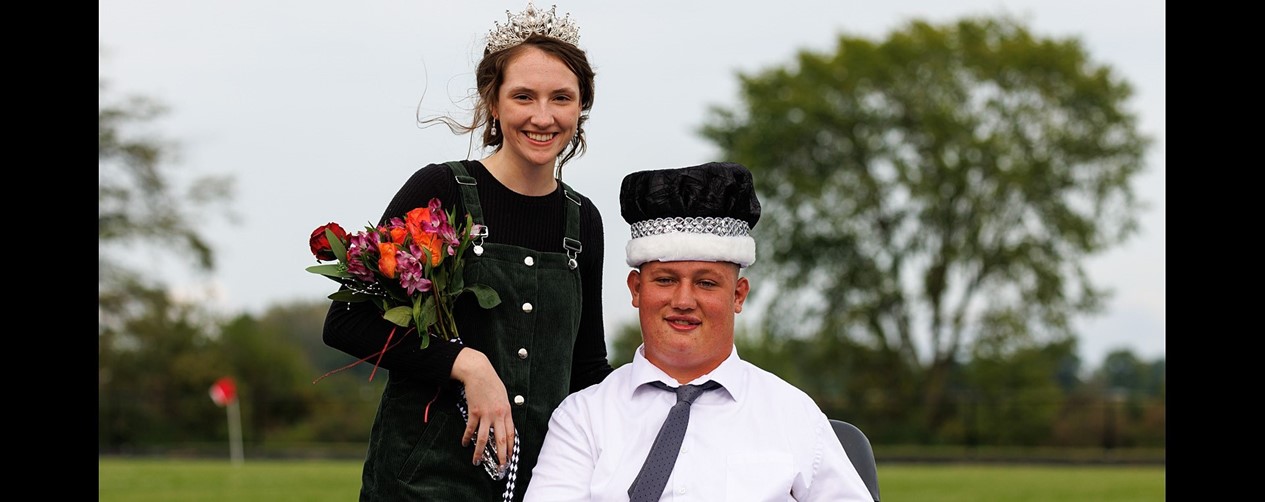 Homecoming queen and king after crowning two of two pictures