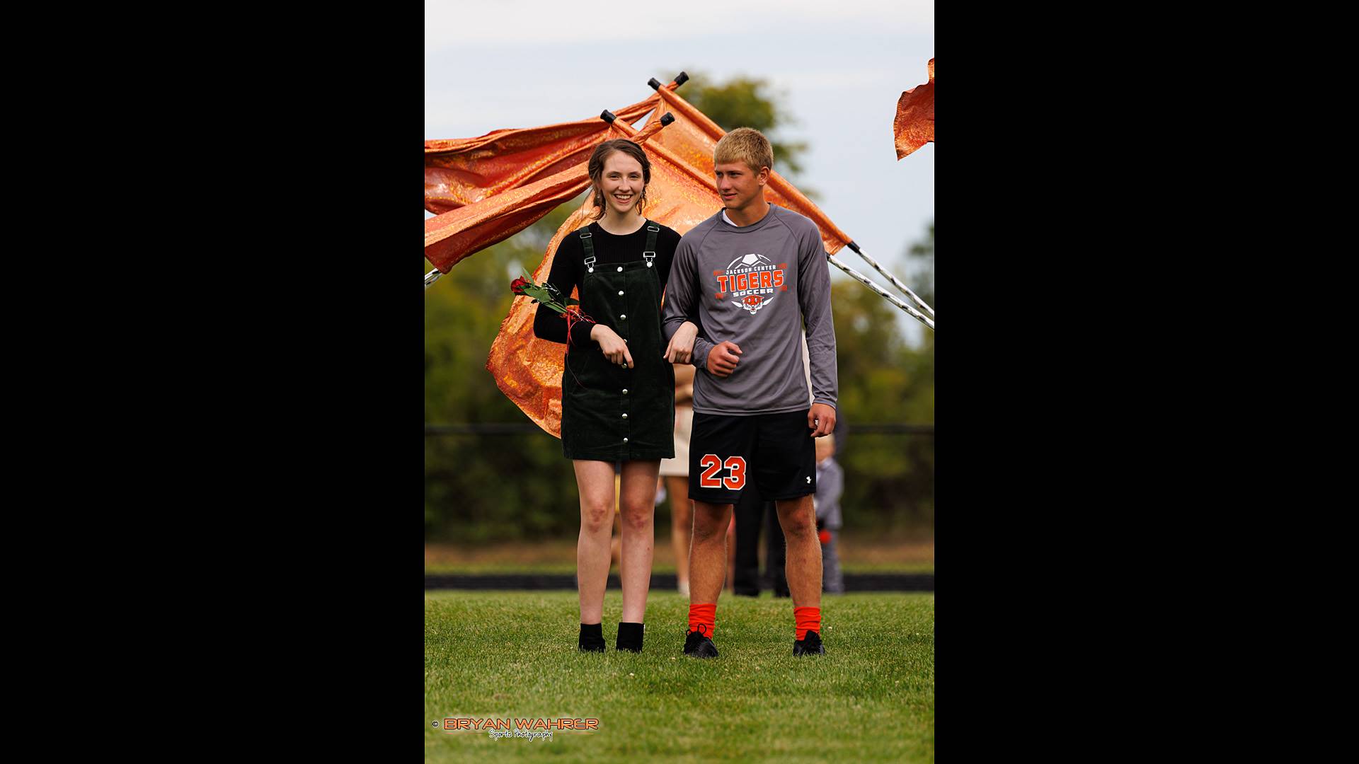 second of three homecoming attendants