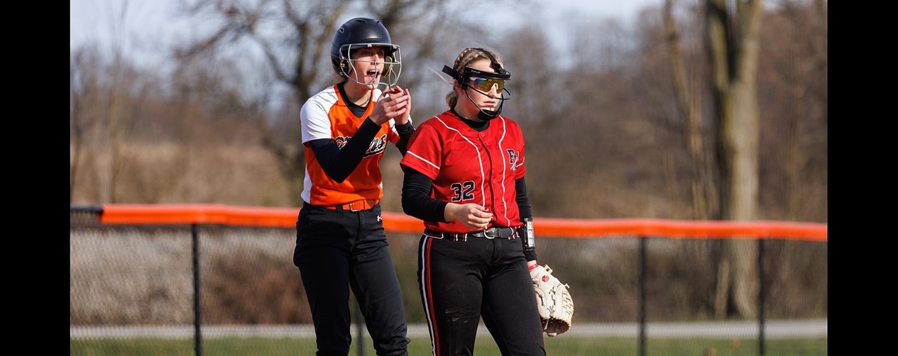 softball player on base