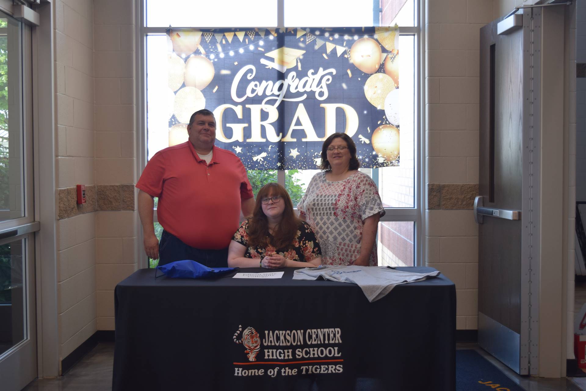 Alexis Kellerman and parents photo booth