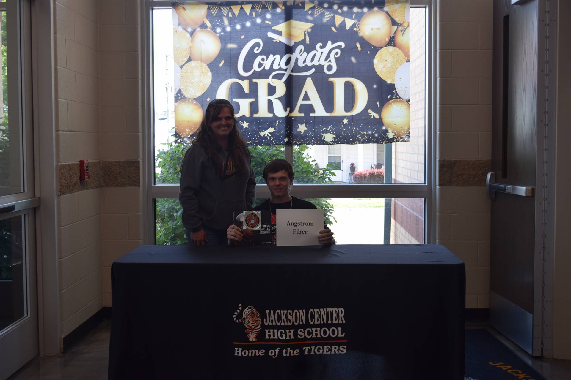 Landen Coburn and mom photo booth
