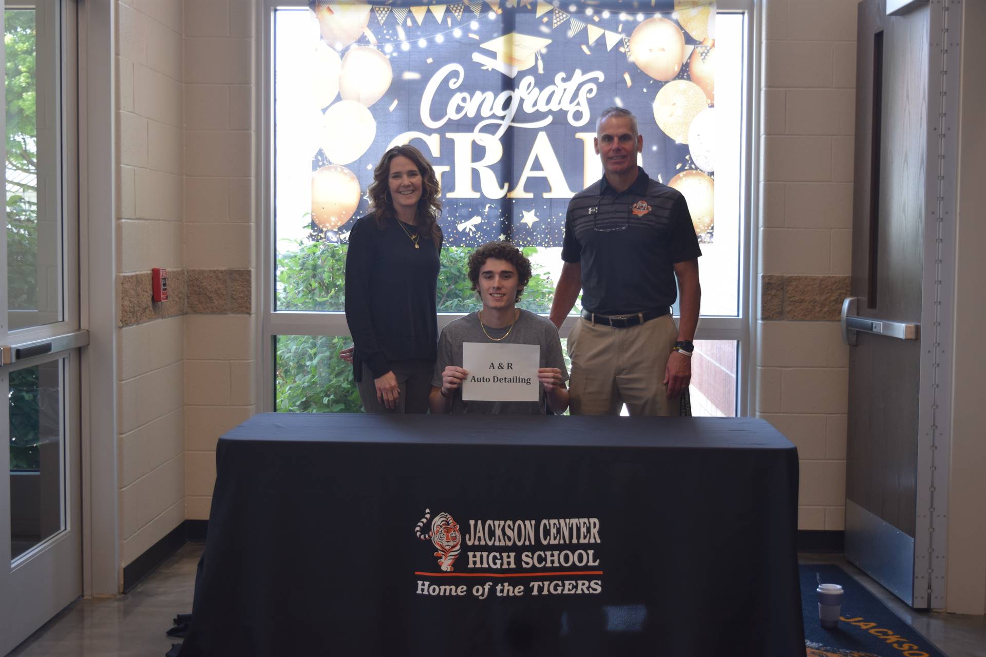 Grant Elchert and parents photo booth