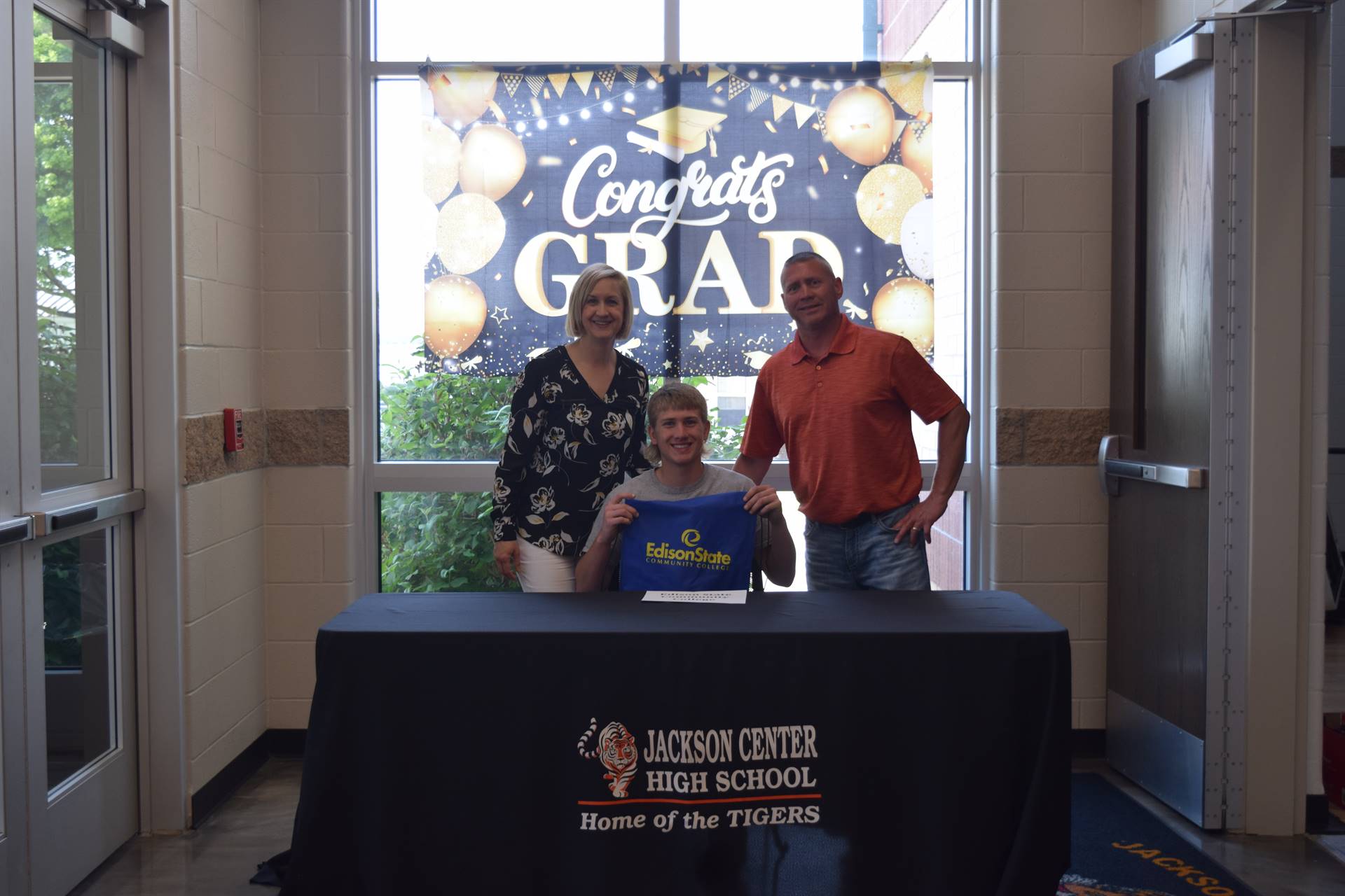 Jace Mullenhour and parents photo booth