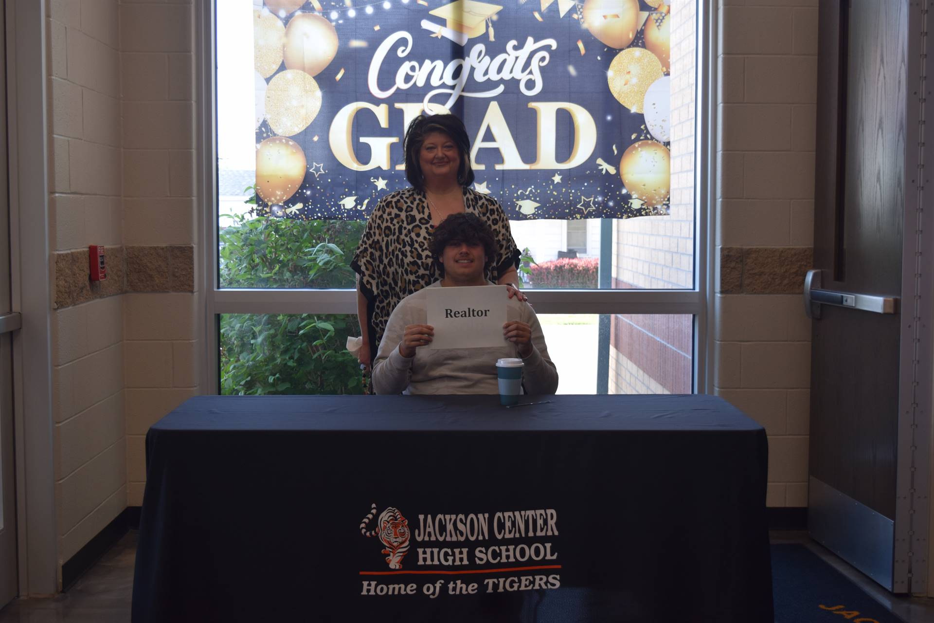 Kalib Minnich and mom photo booth