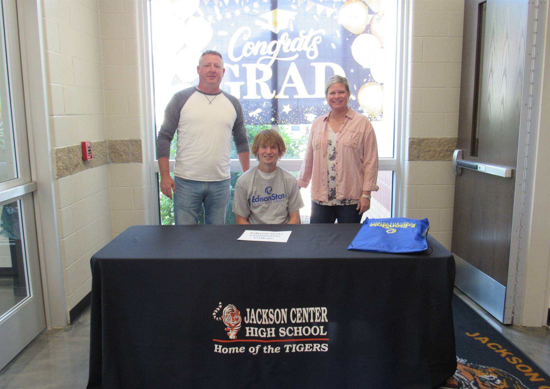 Nolan Fark and parents photo booth