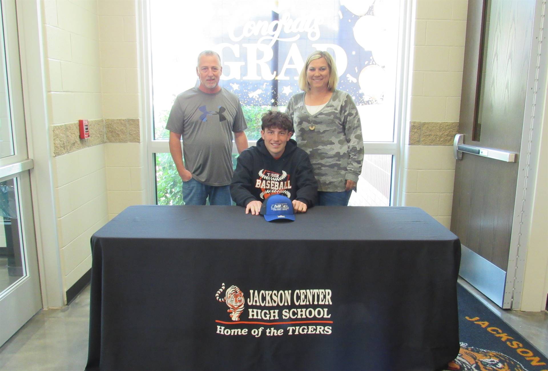 Bryson Roberts and parents photo booth