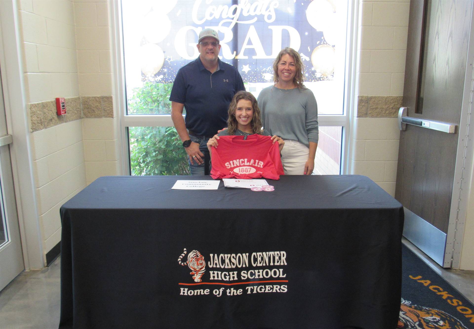 Haylee Shields and parents photo booth