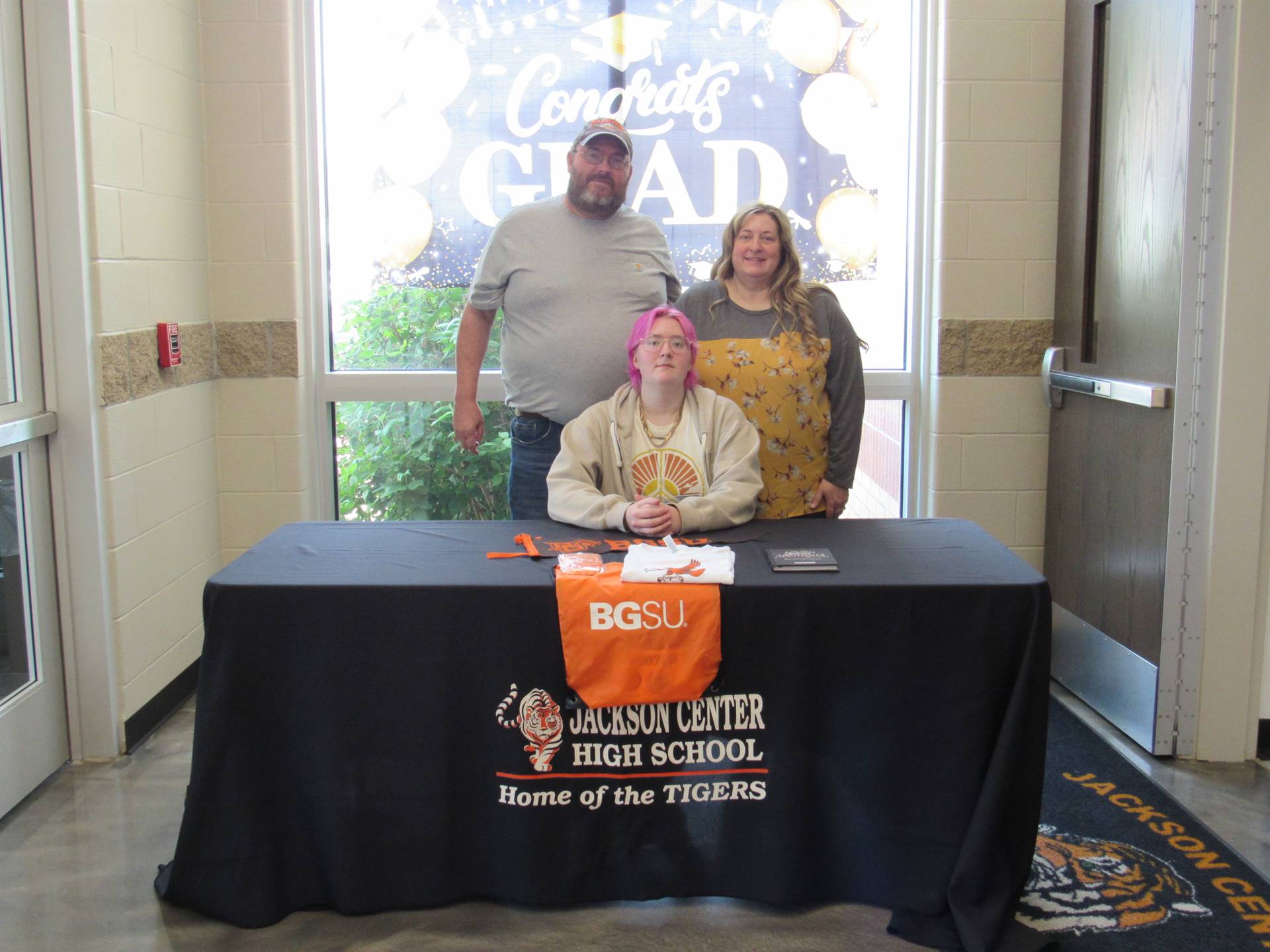 Claire Willoby and parents photo booth