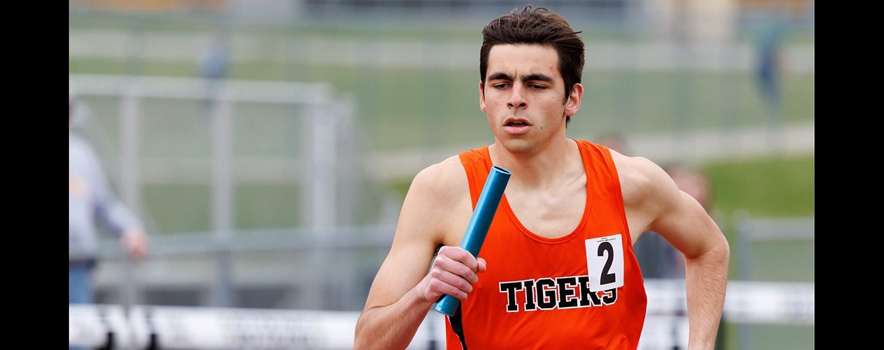 Boy Track relay runner